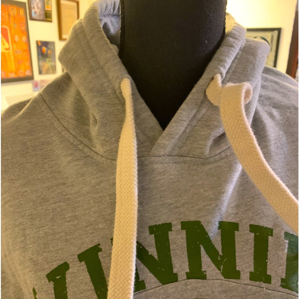 Woman’s mid drift hooded sweatshirt.